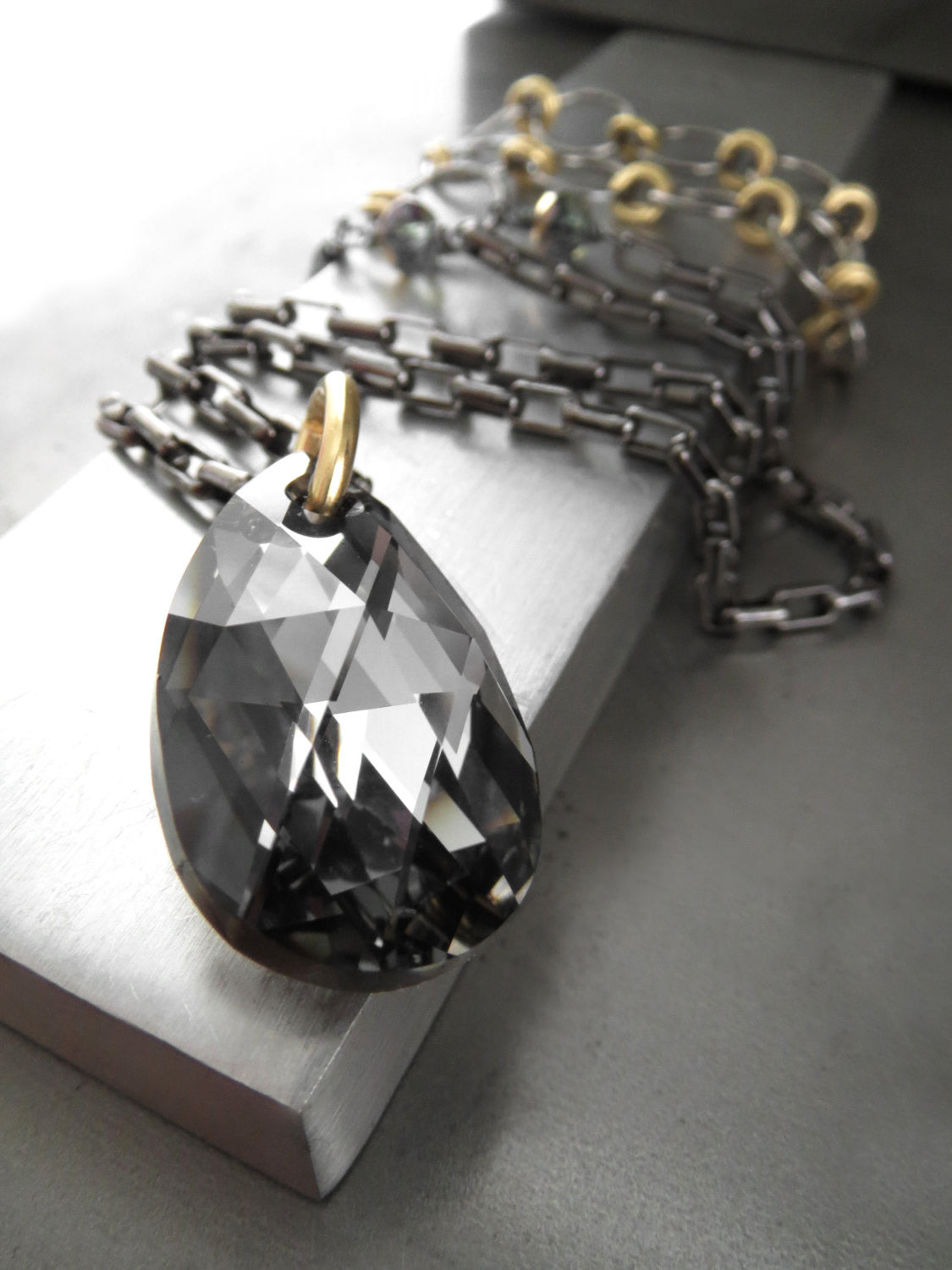Black Night Crystal Teardrop Pendant Necklace with Gold Accents
