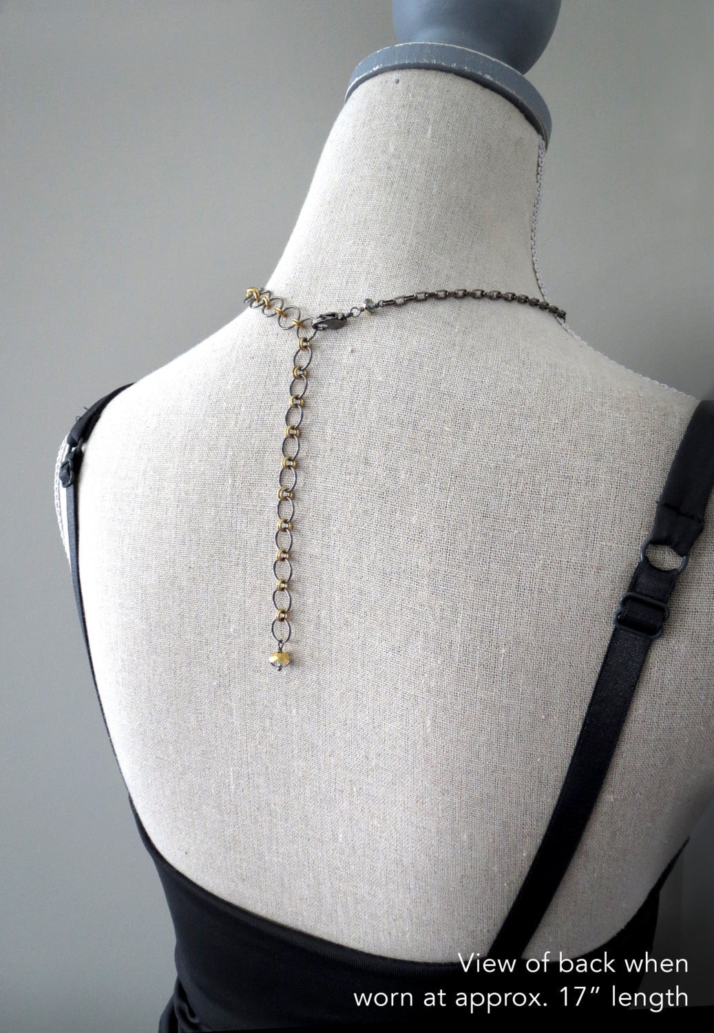 Black Night Crystal Teardrop Pendant Necklace with Gold Accents