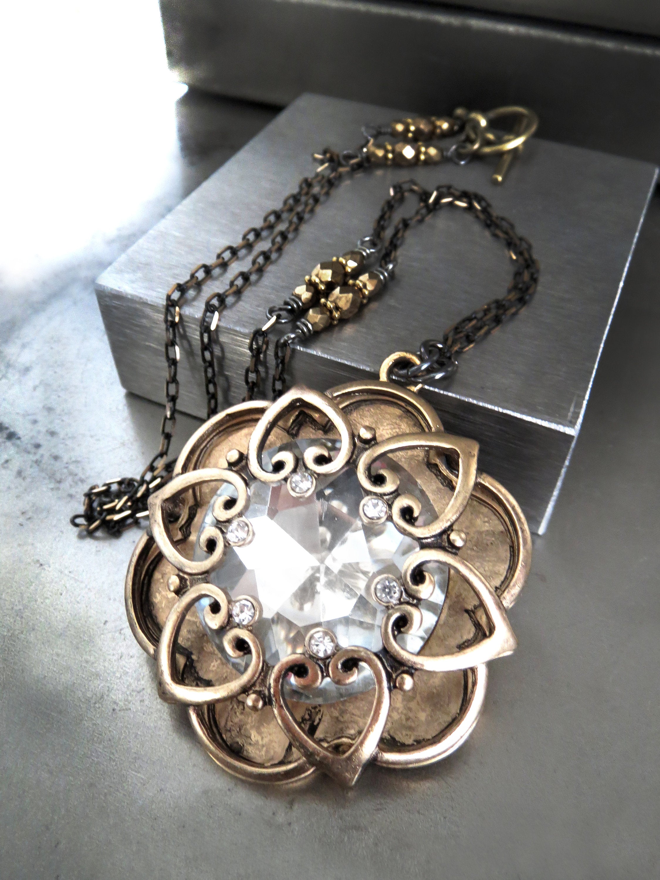INNER LIGHT - Large Crystal Pendant with Antique Gold Mandala Cage on Black-Gold Chain, Romantic Jewelry for New Years Eve, Valentines Day