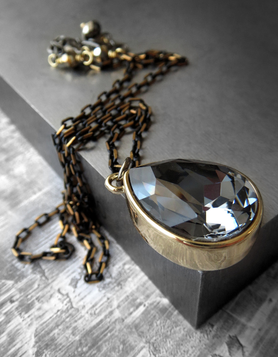Black Night Crystal Teardrop Necklace with Gold Bezel