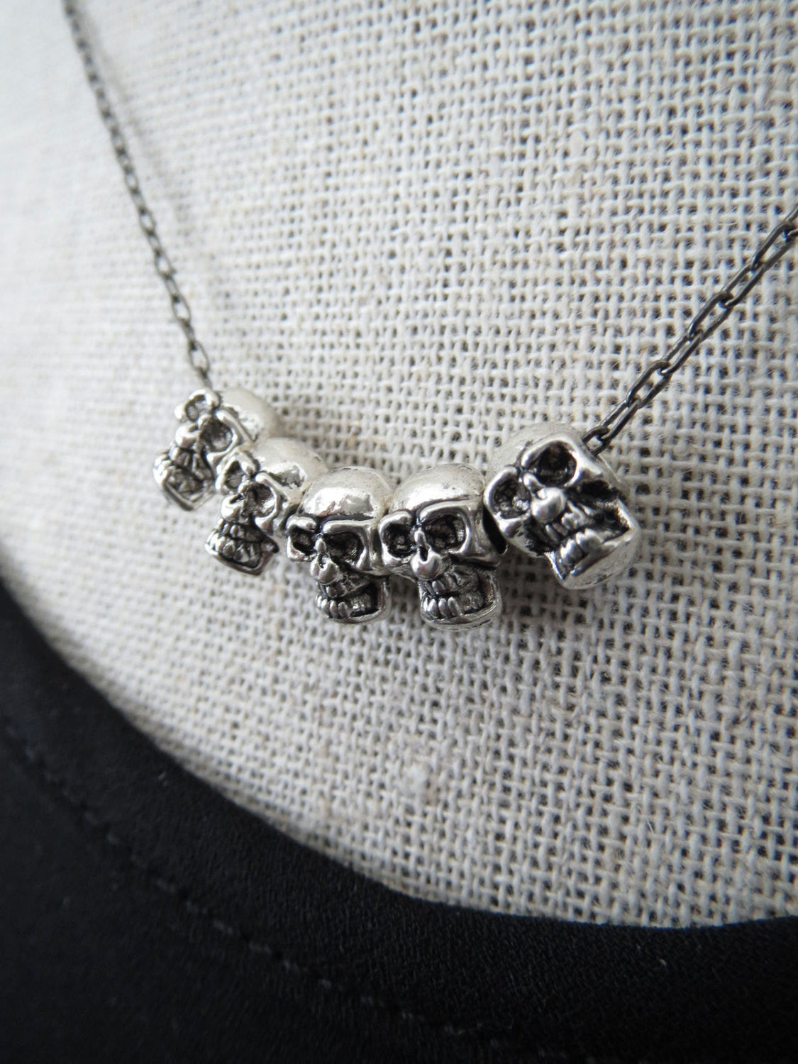 Five Teeny-Tiny Silver Skulls Necklace