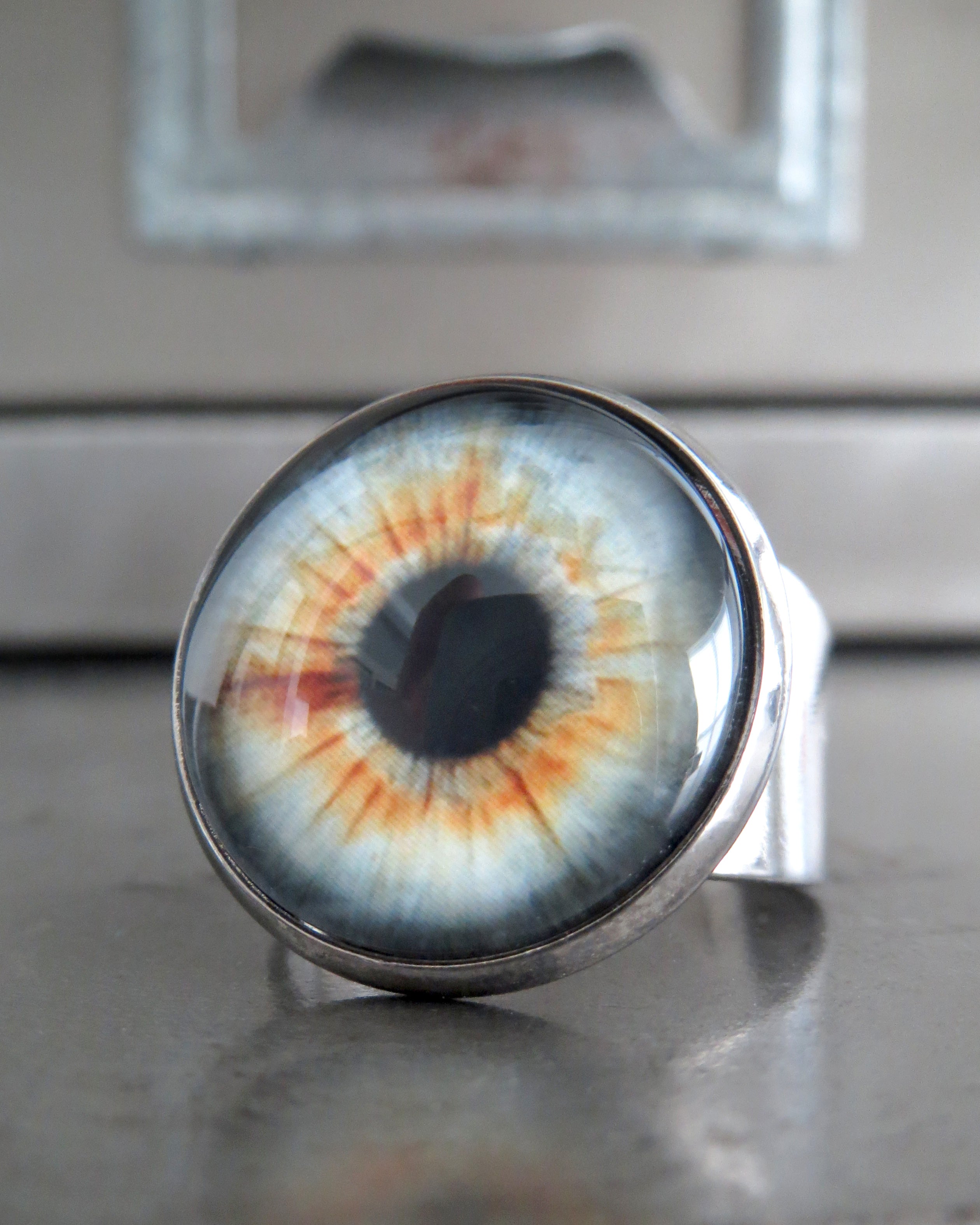 Goth Halloween Eyeball Ring with Realistic Amber Fleck Eye - Grey/Pale Blue
