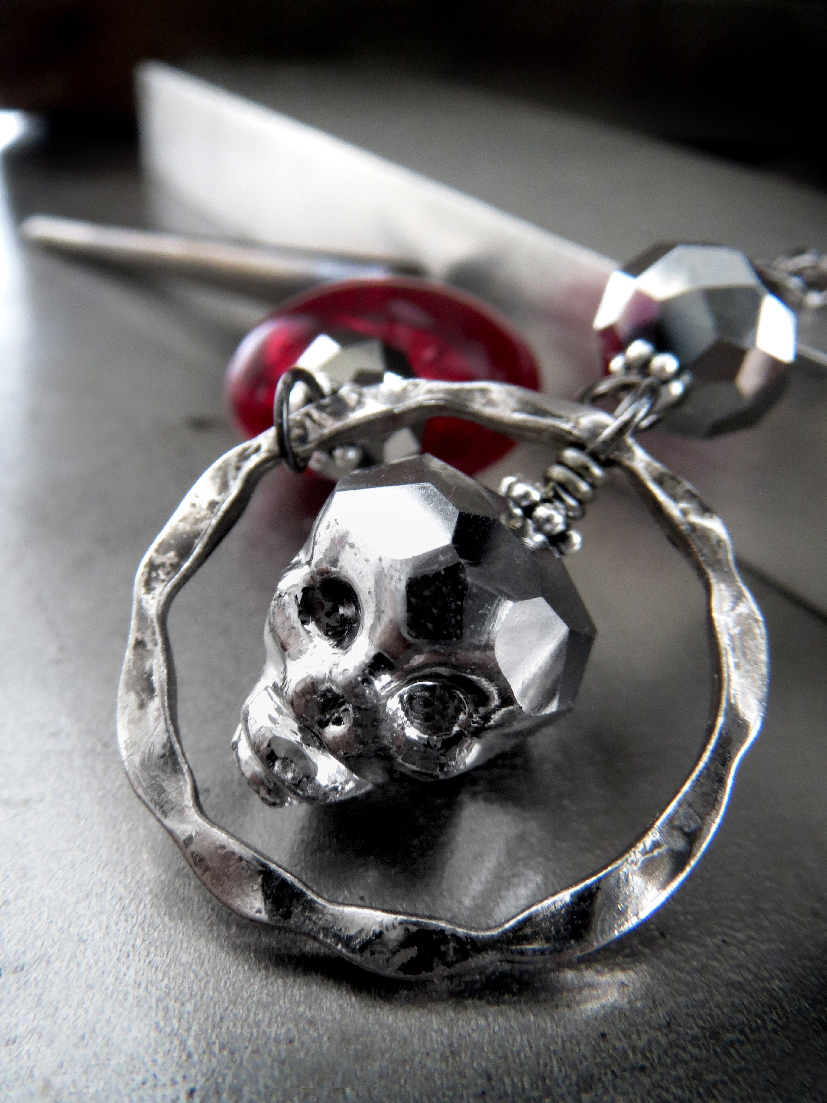 Metallic Silver Skull Necklace with Blood Red Heart Pendant